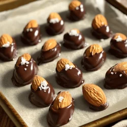 In this section, I’ll share the essential ingredients for making chocolate-dipped almonds. Each item plays a key role in bringing out the best flavors. Let's dive into what you need. - Raw almonds - Dark chocolate chips (at least 70% cocoa) - Optional: Coconut oil (for smoother chocolate) - Optional: Sea salt - Optional: Vanilla extract - Optional: Cinnamon Using raw almonds gives you a nice crunch. Dark chocolate chips add rich flavor and depth. Coconut oil makes the chocolate smooth and easy to dip. Adding sea salt enhances the sweet taste. Vanilla extract and cinnamon can bring warmth to your snack. These ingredients make chocolate-dipped almonds a simple yet delicious treat. For the complete recipe, check out the Full Recipe. Enjoy creating this delightful snack! 1. First, preheat your oven to 350°F (175°C). 2. Next, spread 1 cup of raw almonds on a baking sheet. Place them in a single layer. 3. Roast the almonds for 10-12 minutes. They should smell nice and look slightly golden. 4. Once done, remove them from the oven and let them cool. 1. To melt the chocolate, grab a heatproof bowl. 2. Add 1 cup of dark chocolate chips and 1 tablespoon of coconut oil if you want. 3. You can use a double boiler or a microwave. If using a microwave, heat it in 30-second intervals. Stir after each time until smooth. 1. For extra flavor, consider adding 1 teaspoon of vanilla extract and ½ teaspoon of cinnamon to the melted chocolate. 2. Now, using a fork, dip each cooled almond into the chocolate. Make sure it's fully coated. 3. Let any extra chocolate drip off before placing it on a parchment-lined baking sheet. 1. While the chocolate is still wet, sprinkle a tiny pinch of sea salt on each almond. This boosts the flavor. 2. Next, place the baking sheet in the fridge for about 30 minutes. This helps the chocolate harden. 3. Enjoy your chocolate-dipped almonds as a snack or treat! You can store them in an airtight container in the fridge for up to 2 weeks. For the full recipe, refer to the earlier sections. To achieve the perfect roast, I recommend preheating your oven to 350°F (175°C). Spread the raw almonds on a baking sheet in a single layer. Roast them for 10 to 12 minutes. Keep an eye on them. You want them fragrant and slightly golden. Over-roasting creates a bitter taste. So, check them often. When melting chocolate, ensure you use a heatproof bowl. You can use a double boiler or a microwave. If you opt for the microwave, heat in 30-second intervals. Stir after each interval until the chocolate is smooth. Adding coconut oil helps create a silky texture. Prevent chocolate from seizing by avoiding water contact. Even a small drop of water can ruin your chocolate. Make sure all your tools are dry before you start melting. You can get creative when serving chocolate-dipped almonds. Try placing them in small bowls or on a decorative plate. They look lovely alongside fresh fruits like strawberries or slices of apple. Pair them with other snacks like cheese or popcorn for a fun mix. For a special touch, drizzle extra melted chocolate over the finished almonds. This adds a nice design and extra flavor. Enjoy your chocolate-dipped almonds as a snack or a treat! If you want the full details, check out the Full Recipe. {{image_2}} You can easily mix up the flavors of your chocolate-dipped almonds. Try adding spices like pumpkin spice or a hint of cayenne for a kick. These spices will add warmth and depth to your snack. You can also switch up the type of chocolate. Use milk chocolate for a sweeter treat or white chocolate for a creamy twist. Each option gives a different taste that can surprise your taste buds. If you want to change the nuts, consider using cashews or pecans. Both add their unique flavors and textures. For those who need vegan or gluten-free options, you can use dairy-free chocolate and ensure your nuts are certified gluten-free. This way, everyone can enjoy this tasty snack. To make your chocolate-dipped almonds even more special, add different toppings. Try toasted coconut for a tropical flair or crushed nuts for extra crunch. You can also drizzle more chocolate on top for a fun design. This adds both beauty and more chocolatey goodness. These small touches make your snack look fancy and taste incredible. To keep your chocolate-dipped almonds fresh, store them in an airtight container. This will help protect them from moisture and air. A glass jar or a plastic container with a tight lid works well. Make sure the container is clean and dry before placing the almonds inside. Chocolate-dipped almonds last about two weeks in the refrigerator. After this time, they may start to lose their crunch and flavor. Look for signs of spoilage like a dull appearance or a strange smell. If they seem off, it's best to toss them out. Enjoy your chocolate-dipped almonds while they're fresh! For the full recipe, check out the detailed instructions earlier. Chocolate-dipped almonds last about two weeks when stored in an airtight container. Keep them in the fridge to stay fresh. After two weeks, they may lose their crunch and flavor. Yes, you can use other nuts like cashews or pecans. Each nut brings a unique taste and texture to the treat. Just follow the same steps in the Full Recipe for dipping. Dark chocolate with at least 70% cocoa is best for melting. It has a rich flavor and balances well with the almonds. You can also use milk or white chocolate if you prefer a sweeter taste. Yes, chocolate-dipped almonds can be healthy in moderation. Almonds are a good source of protein and healthy fats. Dark chocolate has antioxidants, too. Just watch your serving size. You can find pre-made chocolate-dipped almonds in many grocery stores or online. Look in the snack aisle or specialty sections. Check brands that focus on natural or organic snacks. You can skip coconut oil and melt the chocolate alone. It will still coat the almonds well, but it may be slightly thicker. Just make sure to stir it often while melting for smoothness. You have learned how to make tasty chocolate-dipped almonds using simple steps. First, you roast almonds and melt dark chocolate. Then, dip each almond and add flavors like vanilla or cinnamon. I also shared tips for perfecting your roast and avoiding common chocolate melting issues. Feel free to explore variations with different chocolates and spice blends. Proper storage keeps them fresh, and following the FAQs eases any doubts. Enjoy your delicious treat as a snack or gift. Happy dipping!
