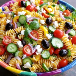 Here are all the ingredients you need for a tasty Quick Italian Pasta Salad: - 8 oz rotini pasta - 1 cup cherry tomatoes, halved - 1 cucumber, diced - 1 bell pepper, diced - 1/2 red onion, finely chopped - 1 cup black olives, sliced - 1/2 cup feta cheese, crumbled - 1/4 cup fresh basil, chopped - 1/4 cup olive oil - 2 tablespoons red wine vinegar - 1 teaspoon dried oregano - Salt and pepper to taste Gather these items before you start. The rotini pasta gives a nice twist to the salad. The fresh veggies add crunch and color. Cherry tomatoes burst with flavor, and feta cheese brings a creamy touch. Fresh basil adds a lovely aroma and ties everything together. Make sure to use good quality olive oil for the best taste. You can find the Full Recipe for more details on how to prepare this delicious dish. To start, boil water in a large pot. Add salt to the water for flavor. Once the water is boiling, add 8 oz of rotini pasta. Cook it until it is al dente, which means it should be firm but not hard. This usually takes about 7-10 minutes. After cooking, drain the pasta in a colander. Rinse it under cold water to stop the cooking process. This makes the pasta nice and cool for the salad. Next, grab your fresh vegetables. You will need 1 cup of cherry tomatoes. Cut them in half. Then, take 1 cucumber and dice it into small pieces. Next, chop 1 bell pepper of any color into cubes. For added flavor, finely chop 1/2 red onion. Finally, slice 1 cup of black olives. And don’t forget to crumble 1/2 cup of feta cheese. All these ingredients will add great taste and texture to your salad. Now, let’s make the dressing. In a small bowl, whisk together 1/4 cup of olive oil, 2 tablespoons of red wine vinegar, and 1 teaspoon of dried oregano. Add salt and pepper to taste. Mix it well until it blends together nicely. In a large mixing bowl, combine the cooled rotini pasta with all the chopped vegetables and the crumbled feta cheese. Pour the dressing over the salad. Gently toss everything to coat all the ingredients evenly. This is where the magic happens! To finish, fold in 1/4 cup of fresh basil. This adds a fresh, aromatic touch. It’s best to let the salad sit for at least 15 minutes before serving. This allows all the flavors to mix well. Enjoy your Quick Italian Pasta Salad! For the complete recipe, check out the Full Recipe section. To boost the flavor of your Quick Italian Pasta Salad, you can add more herbs. Fresh herbs like parsley or oregano work well. They add a burst of freshness. You can also try dried herbs like thyme or marjoram. Each herb brings its own unique taste. Using high-quality olive oil is key too. A good olive oil elevates the salad's overall flavor. Look for extra-virgin olive oil. It has a rich taste that enhances your dish. The oil adds depth to the dressing and complements the vegetables. For the best flavor, let the salad sit for about 15 minutes before serving. This time helps the flavors meld together. You will notice a big difference in taste. When it comes to presentation, serve the salad in a large, colorful bowl. Garnish with extra basil leaves and a sprinkle of feta cheese. This makes the dish look vibrant and inviting. Your guests will love the visual appeal as much as the taste! {{image_2}} You can add protein to your pasta salad for extra taste and nutrition. Here are some great options: - Grilled Chicken: Slice it into strips and mix it in. - Shrimp: Cooked shrimp adds a nice seafood touch. - Chickpeas: These are great for a vegetarian option. They add fiber and protein. Adding protein makes the dish more filling and satisfying. Feel free to swap out ingredients based on what you have at home. Here are some ideas: - Cheeses: Try mozzarella or goat cheese instead of feta. Each brings a unique flavor. - Vegetables: You can use spinach, artichokes, or zucchini. These add color and crunch. Mixing in different ingredients keeps the salad fresh and exciting. The dressing can change the whole flavor of your pasta salad. Here are some alternatives to try: - Pesto: It gives a rich, herby taste. - Italian Dressing: This can add a zesty kick. - Lemon Vinaigrette: A bright option to lighten the dish. Experimenting with dressings can help you find your favorite flavor profile. Don't be afraid to get creative! For the full recipe, refer to the section above. To keep your Quick Italian Pasta Salad fresh, store it in an airtight container. This will help keep the flavors intact and prevent any odors from getting in. Place it in the fridge right after serving. If you have leftovers, try to eat them within a few days for the best taste. In the fridge, this pasta salad lasts about 3 to 5 days. After that, the vegetables may lose their crunch. Always check for any signs of spoilage before eating. If it smells off or looks strange, throw it away. Can you freeze this salad? Yes, but it requires some care. Freeze only the pasta and vegetables, not the dressing. Mix the dressing fresh when you’re ready to eat. To freeze, place the pasta and veggies in a freezer-safe bag. Squeeze out all the air before sealing. To use, thaw in the fridge overnight and mix with the fresh dressing. Quick Italian Pasta Salad will stay fresh for about 3 to 5 days in the fridge. Store it in an airtight container. The flavors will deepen as it sits, making it even tastier. Just check for any signs of spoilage before eating. Yes, you can make this salad a day in advance. This allows the flavors to blend well. Just keep it in the fridge. If making it early, add fresh herbs like basil right before serving. This keeps them bright and fresh. If you don’t have rotini pasta, you can use penne, fusilli, or bowtie pasta. These shapes hold the dressing well and mix nicely with the veggies. Just cook any alternative pasta according to its package instructions. To make this recipe gluten-free, use gluten-free pasta. There are many good options available now. Always check the label to ensure that it meets your dietary needs. The rest of the ingredients are naturally gluten-free, making it easy to adapt. This blog post shows how to make a tasty Quick Italian Pasta Salad. You learned about the key ingredients, easy steps, and handy tips. We've also discussed variations and storage tips to extend freshness. Whether you add protein or use different veggies, the salad stays delicious. Try making it ahead for parties or meal prep. This salad is fun, simple, and a great dish for any table. Enjoy your cooking and impress your friends with this easy meal!