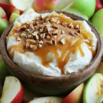 - 1 (8 oz) package cream cheese, softened - ½ cup powdered sugar - ¼ cup brown sugar - 1 teaspoon vanilla extract - ½ cup caramel sauce - ½ teaspoon cinnamon - 2-3 apples (such as Granny Smith or Honeycrisp) - Chopped nuts (for garnish) You can change up this recipe with fun extras. Try adding mini chocolate chips for a sweet touch. You can also use different nuts, like almonds or pecans. If you want a twist, add a splash of maple syrup for flavor. For sweeteners, feel free to swap the sugars with alternatives like honey or agave syrup. You can also use a sugar-free caramel sauce if preferred. These options can make the dip fit your taste or dietary needs. Enjoy creating your perfect caramel apple dip! For the full recipe, check out the detailed instructions. Start by grabbing your mixing bowl. Take the softened cream cheese and beat it well. Use an electric mixer for this step. You want it to become smooth and creamy. This is the base of your dip. Next, add in the powdered sugar, brown sugar, and vanilla extract. Mix everything together until it’s fluffy. This sweet mixture will make the dip rich and tasty. Now, it’s time to layer. Take your creamy mix and spread it evenly into a serving dish. This will be the first layer people see. It should look nice and inviting. Now comes the fun part! Drizzle the caramel sauce over your cream cheese layer. Make sure to cover it well. This adds a sweet touch that everyone loves. Then, sprinkle cinnamon over the caramel. This will give it a warm flavor. If you like nuts, add chopped nuts on top. They add a great crunch! After adding the toppings, it’s time to chill. Place the dip in the refrigerator for about 30 minutes. This step is key because it lets the flavors mix. Chilling makes it taste even better! After it’s chilled, serve it with sliced apples. The fresh apples make a great pair with the dip. Enjoy your delicious Caramel Apple Dip with Cream Cheese! To get the best dip, use softened cream cheese. Softened cream cheese blends well and gives a smooth texture. Cold cream cheese can make your dip lumpy. Leave it out for about 30 minutes before mixing. When you beat the cream cheese, use a hand mixer or a stand mixer. Mix at medium speed for about two minutes. This helps to make the dip fluffy and light. You can add fun mix-ins to your dip. Try adding mini chocolate chips for a sweet twist. Chopped nuts also add crunch and flavor. If you like spice, add a pinch of nutmeg or ginger. Adjust the sweetness by adding more or less brown sugar. Taste as you go to find your perfect balance. The right apples can make your dip shine. I recommend Granny Smith apples for their tartness. Honeycrisp apples are sweet and crunchy, too. Slice your apples just before serving to keep them fresh. For a fun serving idea, use a cute bowl for the dip and place the apple slices around it. You can even add a few caramel candies on top for decoration. {{image_2}} You can mix up the flavors of your caramel apple dip. One tasty option is to add chocolate. You can swirl in some melted chocolate or sprinkle chocolate chips on top. The rich taste of chocolate pairs well with the sweetness of caramel. You can also add nuts or fruits to your dip. Chopped pecans or walnuts give a nice crunch. For a fruity twist, try adding dried cranberries or raisins. These add color and a bit of tang. Each bite can surprise you with new flavors. Seasonal changes can inspire new dips. For the holidays, you might want to sprinkle festive spices like nutmeg or ginger. A layer of crushed candy canes on top can make it even more special. You can also use seasonal fruits in your dip. In fall, crisp apples work great. In summer, try fresh peaches or strawberries. Each season brings a new chance to explore flavors. You can make this dip fit different diets easily. For a gluten-free option, just check that your caramel sauce is gluten-free. Many brands offer sauces that fit this need. If you want a vegan dip, you can swap cream cheese for a plant-based version. Use coconut or almond cream and vegan caramel sauce. This way, everyone can enjoy this tasty treat. For the full recipe, check out the [Full Recipe]. To keep your leftover dip fresh, store it in an airtight container. This will help prevent it from absorbing other smells in your fridge. If you want to keep it safe, use glass or plastic containers with tight-fitting lids. These containers keep moisture in and air out. The dip lasts about 3 to 5 days in the fridge. Make sure to check for any changes in smell or texture before eating it. If it looks or smells off, it’s best to throw it away. Yes, you can freeze the dip! To freeze it, place it in a freezer-safe container. Leave some space at the top for expansion. To thaw the dip, place it in the fridge overnight. This keeps the texture smooth. Before serving again, stir it gently to mix any separated ingredients. For the full recipe, check the link provided. Enjoy your caramel apple dip! Can I use low-fat cream cheese? Yes, you can use low-fat cream cheese. It will still taste good. Just remember, it may be a bit less creamy. How can I make caramel sauce from scratch? Making caramel sauce is simple! You need sugar, butter, and cream. Cook sugar until it melts and turns golden. Stir in butter, then add cream slowly. Cook until smooth. What kind of fruits can I dip? You can dip many fruits! Try apples, pears, bananas, or strawberries. These fruits pair well with the sweet dip. Why is my dip too runny? Your dip may be too runny if the cream cheese is not firm enough. Make sure to use softened cream cheese, not melted. What to do if the flavors are too strong? If the flavors are too strong, add more cream cheese. Mix it in to balance the taste. For the complete recipe details, check out the [Full Recipe](#). This blog post covered a tasty cream cheese dip recipe. You learned about the main ingredients, optional add-ins, and step-by-step instructions. I also shared tips for the best texture and flavor. You can even find variations and storage info. Creating this dip can be fun and easy. It’s a perfect treat for sharing. You can customize it to fit any occasion or flavor you like. Enjoy your dip and happy cooking!