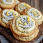 - 1 cup cream cheese, softened - ½ cup unsalted butter, softened - ¾ cup granulated sugar - 1 large egg - 1 tablespoon lemon zest - 2 tablespoons lemon juice - 1 ½ cups all-purpose flour - ½ teaspoon baking powder - ¼ teaspoon baking soda - ¼ teaspoon salt - 2 tablespoons poppy seeds - Powdered sugar, for dusting Each ingredient in these Lemon Poppy Seed Cheesecake Cookies plays a key role in flavor and texture. - Cream cheese gives the cookies a rich, creamy base. Its smooth texture helps bind the dough. - Unsalted butter adds a rich flavor. It also helps make the cookies soft and chewy. - Granulated sugar sweetens the cookies and helps them brown nicely. - Egg binds all the ingredients together and adds moisture. - Lemon zest brings a bright, fresh flavor. It adds that wonderful citrus kick. - Lemon juice enhances the lemon flavor and keeps cookies moist. - All-purpose flour gives structure to the cookies. - Baking powder and baking soda help the cookies rise and become fluffy. - Salt balances the sweetness and enhances overall flavor. - Poppy seeds add a delightful crunch and a hint of nuttiness. - Powdered sugar provides a sweet, light finish for the cookies. If you need to make swaps, here are some ideas: - Cream cheese: Use mascarpone cheese for a lighter texture. - Unsalted butter: Coconut oil works well for a dairy-free option. - Granulated sugar: Try using coconut sugar for a more natural sweetener. - Egg: Replace with a flax egg (1 tablespoon ground flaxseed + 2.5 tablespoons water) for a vegan choice. - All-purpose flour: Use almond flour for a gluten-free option. - Lemon juice: Lime juice can substitute for a different citrus taste. - Poppy seeds: Chia seeds can be used for a similar texture. These substitutions keep your cookies delicious while fitting your needs! You can find the Full Recipe to guide you through making these delightful snacks. First, gather your ingredients. You need: - 1 cup cream cheese, softened - ½ cup unsalted butter, softened - ¾ cup granulated sugar - 1 large egg - 1 tablespoon lemon zest - 2 tablespoons lemon juice - 1 ½ cups all-purpose flour - ½ teaspoon baking powder - ¼ teaspoon baking soda - ¼ teaspoon salt - 2 tablespoons poppy seeds - Powdered sugar, for dusting Next, preheat your oven to 350°F (175°C). Line two baking sheets with parchment paper. This helps the cookies not stick. In a large bowl, beat the cream cheese and butter until smooth. Add the sugar and mix for about 2-3 minutes. It should be light and fluffy. Then, mix in the egg, lemon zest, and lemon juice. Make sure everything blends well. In another bowl, whisk together the flour, baking powder, baking soda, and salt. Slowly add this dry mix to the wet mix. Stir until just combined. You don’t want to over-mix. Finally, fold in the poppy seeds gently. This way, they spread evenly in the dough. Now, scoop tablespoon-sized balls of dough onto the baking sheets. Keep them about 2 inches apart. This gives them space to spread while baking. Bake the cookies in your preheated oven for 12-15 minutes. They should look lightly golden around the edges. Keep an eye on them. Every oven is different. Once baked, let the cookies cool on the baking sheets for 5 minutes. This helps them set. Then, transfer them to a wire rack to cool completely. When they are cool, dust the cookies with powdered sugar. This adds a nice touch and a bit of sweetness. For the full recipe, check the earlier section. Enjoy your tasty lemon poppy seed cheesecake cookies! When baking, it’s easy to make small errors. I often see people skip the softening step for cream cheese and butter. This step is key for a smooth mix. If your butter is cold, the cookies may not spread well. Always measure your flour correctly. Too much flour can lead to dry cookies. Use a spoon to scoop flour into your measuring cup, then level it off with a knife. To get the right texture, beat your cream cheese and butter well. This creates air pockets that make the cookies fluffy. Adding the egg slowly helps with a uniform mix. When you add dry ingredients, mix just until combined. Overmixing can make the cookies tough. Lastly, folding in the poppy seeds gently ensures they stay intact. Timing is key when baking. Set your timer for 12 minutes, but keep an eye on them. The edges should be lightly golden, while the center looks soft. If you like a chewier cookie, take them out a minute early. Let them cool on the baking sheet for five minutes before moving them. This helps them firm up without breaking apart. You can find the Full Recipe to guide you through the entire process. {{image_2}} You can easily change the taste of your Lemon Poppy Seed Cheesecake Cookies. Adding extracts gives a new twist. For a richer flavor, try adding a teaspoon of vanilla extract. Almond extract also works well. Just remember, a little goes a long way. You could even add a splash of coconut extract for a tropical vibe. If you need a gluten-free version of these cookies, I have you covered. You can replace all-purpose flour with a gluten-free baking blend. Make sure it has xanthan gum for the best texture. This swap keeps your cookies soft and chewy. You won't lose any flavor, which is a win for gluten-free baking! Want to make your cookies even more fun? Consider adding creative mix-ins. Chopped nuts like walnuts or pecans add crunch. You could even throw in some mini chocolate chips for a sweet surprise. Dried fruits, like cranberries or raisins, can add a nice chewiness. Each of these add-ins can change your cookie game completely! For the full recipe, check back to get started on your baking adventure. To keep your Lemon Poppy Seed Cheesecake Cookies fresh, store them in an airtight container. This helps to lock in moisture. Place a piece of parchment paper between layers to prevent sticking. Avoid direct sunlight and heat. Keep the cookies in a cool, dry place. This will help maintain their flavor and texture. When stored properly, these cookies last about one week. You may notice they taste best in the first few days. After that, they may lose some freshness. If you keep them in the fridge, they can last up to two weeks. Just remember to let them warm up a bit before enjoying. To freeze your cookies, first, let them cool completely. Place them in a single layer on a baking sheet. Freeze for about an hour until firm. Then, transfer the cookies to a freezer-safe bag. Remove as much air as you can. They can last up to three months in the freezer. When ready to eat, thaw them at room temperature. For an extra treat, warm them in the oven for a few minutes. Enjoy your homemade delight! For the full recipe, check the section above. To make these cookies, start by mixing the cream cheese and butter in a bowl until smooth. Next, add the sugar and beat until fluffy. Then, mix in the egg, lemon zest, and lemon juice. In another bowl, whisk the flour, baking powder, baking soda, and salt. Gradually add the dry mix into the wet mix. Lastly, fold in the poppy seeds. Scoop the dough onto baking sheets and bake at 350°F for 12-15 minutes. You can find the Full Recipe for more details. Yes, you can use other citrus fruits! Oranges and limes work well in this recipe. They add different flavors and aromas, making your cookies unique. Just replace the lemon zest and juice with your chosen citrus. Adjust the amounts as needed to keep the balance right. Experimenting with flavors can bring fun twists to your baking! If you need a substitute for cream cheese, try using ricotta cheese or Greek yogurt. Both options give a creamy texture and similar taste. You can also use vegan cream cheese for a dairy-free version. Adjust the sugar slightly if using yogurt, as it can be tangier. Always choose a substitute that complements the lemon flavor for the best results. This article covered the key ingredients and their roles in your baking. I shared step-by-step instructions for perfect cookies. We discussed common mistakes and tips for the best texture. You also learned about flavor variations and creative add-ins. Lastly, we reviewed storage tips to keep cookies fresh. Baking cookies can be fun and easy with these tips. Explore each section and enjoy your cookie-making journey!