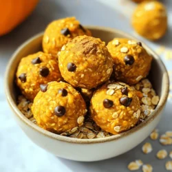 - 1 cup rolled oats - 1/2 cup pumpkin puree - 1/3 cup almond butter (or nut butter of choice) - 1/4 cup honey or maple syrup - 1 teaspoon pumpkin pie spice - 1/2 teaspoon vanilla extract - 1/4 cup ground flaxseed - 1/4 cup mini chocolate chips (optional) - Pinch of salt When I make Pumpkin Spice Energy Bites, I love using simple, healthy ingredients. Each one plays a key role in flavor and nutrition. Rolled oats give a nice chew and energy boost. Pumpkin puree adds a creamy texture and rich flavor. Almond butter, or any nut butter, binds everything together while adding healthy fats. Honey or maple syrup sweetens the bites naturally. Pumpkin pie spice gives that warm, cozy taste. The pinch of salt enhances all the flavors. Ground flaxseed is my secret for extra fiber and nutrients. I sometimes toss in mini chocolate chips for a touch of sweetness and fun. You can find the full recipe above to help you get started. - You can swap almond butter for peanut or sunflower seed butter. - Use agave syrup or brown sugar instead of honey. - Try cinnamon or ginger if you don’t have pumpkin pie spice. These substitutions let you customize the bites to your taste and needs. - Pumpkin is packed with vitamins and fiber. It supports eye health and boosts immunity. - Oats are great for heart health and keep you full longer. They also provide energy. - Flaxseed adds omega-3 fatty acids and helps digestion. - Dark chocolate contains antioxidants, which can help fight free radicals in the body. These ingredients not only taste good but also support your health. Enjoying a tasty snack can be good for you! - Mixing dry ingredients In a large bowl, combine 1 cup of rolled oats and 1/4 cup of ground flaxseed. Stir them well to mix. - Preparing the wet mixture In another bowl, blend 1/2 cup of pumpkin puree, 1/3 cup of almond butter, 1/4 cup of honey, 1 teaspoon of pumpkin pie spice, 1/2 teaspoon of vanilla extract, and a pinch of salt. Mix until smooth. - Combining the wet and dry ingredients Pour the pumpkin mix into the dry ingredients. Stir until everything is well combined. - Techniques for rolling into balls Grab about 1 tablespoon of the mixture. Roll it in your hands to form a ball. This part is fun and hands-on! - Tips for uniform sizing Use a small scoop to keep the sizes even. This helps all the bites look nice and cook evenly. - Importance of chilling Place the energy bites on a parchment-lined plate and refrigerate them for at least 30 minutes. Chilling firms them up. - Serving suggestions Serve the energy bites in a small bowl. You can sprinkle extra pumpkin pie spice on top for a special touch. These bites are great for a snack or after workouts. To get your energy bites just right, focus on texture and flavor. - Achieving the right texture: You want your bites chewy but not too sticky. If they feel too wet, add more oats or flaxseed. If they are too dry, a splash of nut butter or a bit more pumpkin puree can help. - Ensuring flavors meld properly: Mix the wet and dry ingredients well. Letting the mixture chill for a bit helps the flavors blend. I find that a 30-minute rest in the fridge does wonders. Storing your energy bites correctly is key to keeping them fresh. - Best ways to store energy bites: Use an airtight container in the fridge for up to one week. This keeps them moist and ready to eat. - Freezing options for longer shelf life: For longer storage, freeze them in a single layer on a baking sheet. Afterward, transfer them to a ziplock bag. They last up to three months in the freezer. How you serve your energy bites can make them even more fun. - Pairing ideas with drinks: Enjoy these bites with a warm chai latte or a glass of almond milk. The flavors really complement each other. - Creative presentations: Present the energy bites in a small bowl. Sprinkle some extra pumpkin pie spice on top for flair. You can also wrap them in cute paper for a nice gift! {{image_2}} You can change the flavor of your pumpkin spice energy bites easily. One way is by adding different spices. Try cinnamon, nutmeg, or ginger for a unique twist. Each spice brings its own taste and warmth. You could also mix in dried fruits. Chopped dates, cranberries, or raisins add sweetness and chewiness. These fruits make your bites even more delicious and fun. If you need gluten-free options, use gluten-free oats. They pack the same nutrition and flavor. For vegan alternatives, swap honey for maple syrup. You can also choose nut butters made from seeds, like sunflower seed butter. This keeps the recipe plant-based and just as tasty. Experimenting with seeds can add crunch and health benefits. Chia seeds or pumpkin seeds are great choices. They boost the protein and fiber in your bites. Mixing in protein powders is another fun idea. This can increase the protein content, making your snacks even more filling. You can use vanilla or chocolate-flavored powders to add extra taste. For the Full Recipe, you can follow the steps laid out above and enjoy these energy bites today! To keep your Pumpkin Spice Energy Bites fresh, use an airtight container. This helps to lock in moisture and flavor. You can store them in the fridge or freezer. If you choose the fridge, they stay firm and tasty. The freezer is great for longer storage. You can freeze them for up to three months. In the pantry, these bites can last about one week. Make sure to keep them in a cool, dry spot. In the fridge, they can last up to two weeks. This extended shelf life is perfect for busy days when you need a quick snack. Watch for changes in smell or texture. If they smell off or feel sticky, toss them out. Also, look for mold. If you see any, it’s time to discard them. Keeping an eye on these signs helps ensure you enjoy your snacks safely. Pumpkin spice energy bites are small, no-bake snacks. They combine oats, pumpkin puree, nut butter, and spices. This recipe is easy and quick, perfect for busy days. You get a tasty treat that is also healthy. You start by mixing rolled oats and ground flaxseed in a bowl. Then, you blend pumpkin puree, nut butter, honey, and spices in another bowl. Pour the wet mix into the dry ingredients and stir well. Finally, roll the mixture into small balls and chill them. Yes, you can change the recipe to fit your taste. Try using different nut butters like sunflower or cashew. You can also swap honey for maple syrup. Adding dried fruits or nuts can add a twist, too. Absolutely! They are packed with nutrients. Oats provide fiber, which helps digestion. Pumpkin is rich in vitamins and antioxidants. Flaxseed adds healthy fats and protein, making these bites a smart snack choice. This recipe makes about 12 to 15 energy bites. You can easily adjust the serving size based on your needs. If you want more, simply double the ingredients. Yes, you can use fresh pumpkin. Just make sure to cook it first and blend it until smooth. Fresh pumpkin can give a different flavor and texture. It’s a great way to use seasonal produce. For the best results, follow the Full Recipe for guidance. You now have all the tools to make tasty pumpkin spice energy bites. We covered ingredients, preparation, storage, and fun variations. Each step is simple and fun, making it easy to get creative. These bites are not just delicious; they're also good for you. Remember to store them well for longer freshness. Enjoy experimenting with flavors and sharing your tasty creations! Your snack time just got a lot better.