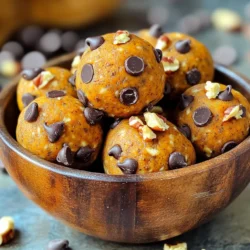 - 1 cup canned pumpkin puree - ½ cup rolled oats - ½ cup almond flour - ¼ cup vanilla protein powder - ¼ cup honey or maple syrup - ½ teaspoon ground cinnamon - ¼ teaspoon nutmeg - ¼ teaspoon salt - ½ cup dark chocolate chips - ¼ cup chopped pecans (optional) - Canned pumpkin puree: This adds fiber and vitamins. It helps keep you full. - Rolled oats: These are great for energy. They provide whole grains and fiber. - Almond flour: This flour is low in carbs and rich in healthy fats. - Vanilla protein powder: This boosts your protein intake. It helps with muscle repair. - Honey or maple syrup: These natural sweeteners add taste and energy. - Ground cinnamon: This spice can help control blood sugar levels. - Nutmeg: This spice adds flavor and may help with digestion. - Salt: It enhances all the flavors in your snack. - Dark chocolate chips: These add a rich taste and antioxidants. - Chopped pecans: These are optional, but add crunch and healthy fats. - Look for 100% pure pumpkin puree. Avoid blends with additives. - Choose old-fashioned rolled oats for the best texture. Instant oats may not work well. - Select blanched almond flour for a finer texture. This makes rolling easier. - Pick a protein powder that fits your diet. Check for added sugars. - Use raw honey or pure maple syrup for better taste and nutrients. - Purchase fresh spices. They should smell strong and fragrant. - Select dark chocolate chips with at least 70% cocoa for health benefits. - If using pecans, buy them whole and chop them yourself for freshness. Making pumpkin chocolate chip protein balls is simple and quick. You can whip these up in just 10 minutes. You will need a mixing bowl, a spatula, and some parchment paper. This recipe makes 12 to 15 protein balls, perfect for a snack or post-workout treat. 1. Mix Wet Ingredients: In a large mixing bowl, combine 1 cup of canned pumpkin puree, ¼ cup of honey or maple syrup, and ¼ cup of vanilla protein powder. Stir until smooth. 2. Add Dry Ingredients: Next, add in ½ cup of rolled oats, ½ cup of almond flour, ½ teaspoon of ground cinnamon, ¼ teaspoon of nutmeg, and ¼ teaspoon of salt. Mix well until everything is blended. 3. Incorporate Chocolate and Nuts: Gently fold in ½ cup of dark chocolate chips and ¼ cup of chopped pecans (if you want). Make sure they are evenly spread throughout the mixture. 4. Shape the Balls: With your hands, scoop about a tablespoon of the mixture. Roll it into a ball shape and place it on a baking sheet lined with parchment paper. 5. Repeat: Keep scooping and rolling until all the mixture is formed into balls. 6. Chill: Put the baking sheet in the refrigerator for at least 30 minutes. This helps the protein balls firm up. 7. Store: Once set, move the protein balls to an airtight container for storage. - Not Mixing Enough: Make sure to mix all wet and dry ingredients well. This ensures even flavor and texture. - Skipping the Chill: Do not skip chilling the protein balls. This step helps them hold their shape. - Ignoring Measurements: Stick to the ingredient amounts. Too much or too little can change the taste and texture. - Overmixing: When adding chocolate chips and nuts, mix just enough to distribute. Overmixing can break them down. With these steps, you will create tasty and healthy pumpkin chocolate chip protein balls that everyone will love! To boost the flavor and texture of your pumpkin chocolate chip protein balls, try adding a touch of vanilla extract. This small addition makes a big difference. You can also swap some almond flour for coconut flour for a different taste. If you love spice, add more cinnamon or a pinch of ginger. This will warm up the flavors nicely. For extra crunch, mix in sunflower seeds or chia seeds. These ingredients help create a delightful texture that keeps each bite interesting. After you shape the protein balls, chill them in the fridge for at least 30 minutes. This helps them firm up and hold their shape better. If you want them even firmer, leave them in the fridge longer. Just keep them in an airtight container to prevent drying out. If they do get too soft, you can pop them back in the fridge to reset. This way, you’ll always get a perfectly shaped snack when you need it. Serve these protein balls in a fun way to impress your friends or family. Arrange them on a decorative plate or in a cute bowl. You can sprinkle extra chocolate chips or chopped pecans on top for a nice touch. These protein balls make an excellent snack for movie night or a quick breakfast on the go. Pair them with a glass of milk or your favorite dairy-free alternative for a balanced treat. Don’t forget, they are also great for lunch boxes or as a post-workout snack! {{image_2}} You can easily swap out ingredients to fit your needs. If you're gluten-free, replace rolled oats with gluten-free oats. Almond flour is great for those avoiding wheat, but you can also use coconut flour if you prefer. For lower sugar, try agave nectar instead of honey or maple syrup. These protein balls are like a blank canvas for flavors. You can add a splash of vanilla extract for more depth. How about a dash of ginger for a spicy kick? You could also mix in dried cranberries or shredded coconut. Each twist gives a fresh taste to your snack! Making these protein balls vegan is simple! Just swap honey or maple syrup for agave nectar. Use a plant-based protein powder to keep it vegan-friendly. For gluten-free, stick with gluten-free oats and check your chocolate chips for gluten-free labeling. These options ensure everyone can enjoy this tasty treat! To keep your protein balls fresh, store them in an airtight container. This helps maintain their taste and texture. You can place a piece of parchment paper between layers to avoid sticking. Always keep them in the fridge for best results. They stay tasty and firm when chilled. These pumpkin chocolate chip protein balls last about a week in the fridge. After that, they may lose their texture and flavor. If you notice any changes in smell or appearance, it's best to toss them. Always trust your senses to ensure freshness. If you want to keep them longer, you can freeze the protein balls. Just place them in a single layer on a baking sheet. Freeze for one hour until firm. Then, transfer them to a freezer-safe bag or container. They can last up to three months in the freezer. When you're ready to eat them, thaw them in the fridge overnight. Enjoy your delicious snack anytime! Yes, you can use fresh pumpkin. First, cook the pumpkin until soft. Then, mash it to get a smooth puree. Make sure to drain any extra liquid. Canned pumpkin is often easier and saves time, but fresh can bring a great taste. You will know the protein balls are set when they feel firm to the touch. After chilling in the fridge for at least 30 minutes, they should hold their shape. If they feel too soft, give them more time to chill. You can use ground flaxseed or chia seeds as a substitute. Both add some protein and fiber. You could also use a nut butter for extra creaminess and protein. Keep in mind that these swaps may change the texture a bit. Yes, these protein balls are great for kids. They are packed with nutrients and taste yummy. The chocolate chips make them fun and appealing. Just make sure your kids are not allergic to any of the ingredients. To lower the sugar, reduce the honey or maple syrup. You can use a sugar-free sweetener that you like. You could also add more pumpkin or oats to keep the texture without adding too much sweetness. In this article, I outlined the key steps to make delicious pumpkin chocolate chip protein balls. We covered ingredients and their health benefits, providing tips for choosing quality options. I also shared step-by-step instructions and common mistakes to avoid. You can enhance flavor and texture while considering variations for dietary needs. Storing these protein balls properly will keep them fresh. Remember, they are fun and easy to make, perfect for everyone in your home. Enjoy creating your own tasty snacks!