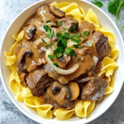 - 2 pounds beef chuck, cut into 1-inch pieces - 8 ounces mushrooms, sliced (cremini or button) - 1 medium onion, finely chopped - 3 cloves garlic, minced - 4 cups beef broth - 2 tablespoons Worcestershire sauce - 1 tablespoon Dijon mustard - 1 teaspoon thyme, dried - 1 cup sour cream - 2 tablespoons all-purpose flour - Fresh parsley, chopped When I make slow cooker beef mushroom stroganoff, I focus on fresh and quality ingredients. The beef chuck is my first choice. It gets really tender and juicy after slow cooking. I cut it into 1-inch pieces for even cooking. I love mushrooms in this dish. I often use cremini or button mushrooms because they add a nice flavor. Sliced thin, they blend well with the sauce. Onions and garlic bring great depth to the dish. I chop the onion finely and mince the garlic. This way, they mix well with the beef and mushrooms. Next, the liquids and seasonings are key. I pour in 4 cups of rich beef broth. It adds flavor and moisture. Worcestershire sauce and Dijon mustard give that umami punch. I also add dried thyme for a hint of earthiness. For a creamier texture, I often use sour cream. Mixing it with flour helps thicken the sauce. Lastly, I like to sprinkle fresh parsley on top for a pop of color and freshness. With these ingredients, I know my stroganoff will be hearty and delicious. Each bite is a blend of flavors that warms the soul. First, gather your ingredients. You need beef, mushrooms, onion, and garlic. Cut the beef into 1-inch pieces. This helps it cook evenly. Next, slice the mushrooms and chop the onion finely. Mince the garlic. Now, add the beef chunks, sliced mushrooms, chopped onion, and minced garlic into your slow cooker. This mix is the heart of your stroganoff. Next, combine the liquids and seasonings. Pour in 4 cups of beef broth. Add in 2 tablespoons of Worcestershire sauce and 1 tablespoon of Dijon mustard. Sprinkle in 1 teaspoon of dried thyme and 1 teaspoon of paprika. Season with salt and pepper to taste. Stir well to mix everything together. Now, it’s time to cook. You can cook on low or high. Cooking on low takes 6-8 hours, while cooking on high takes 4-5 hours. I recommend low for the best flavor and tenderness. The longer cook time helps the beef become soft and juicy. Check the beef for tenderness around the end of the cooking time. It should easily fall apart with a fork. About 30 minutes before you serve, prepare the sour cream mixture. In a bowl, whisk 1 cup of sour cream with 2 tablespoons of flour, if you want a thicker sauce. This step is optional but adds creaminess. Stir this mixture into the stroganoff in the slow cooker. Let it cook for another 30 minutes on low. This helps thicken the sauce. Taste and adjust the seasoning if needed. While the stroganoff finishes, cook 12 ounces of egg noodles according to package instructions. Drain them once cooked and set aside. Serve the beef stroganoff over the noodles. Garnish with fresh chopped parsley for a pop of color and flavor. Enjoy your hearty meal! To boost the flavor of your stroganoff, use spices and herbs wisely. I love adding thyme and paprika for warmth. These spices enhance the beef's rich taste. You can also try adding a bay leaf while cooking. When it comes to seasoning, taste as you go. Start with salt and pepper, then adjust. Add more if needed, but do this slowly. A sprinkle of fresh parsley at the end adds brightness. You can thicken your sauce with flour or skip it entirely. If you choose flour, mix it with sour cream first. This keeps lumps from forming in your sauce. If you want a flour-free option, try cornstarch. Mix cornstarch with cold water to make a slurry. Stir this into the slow cooker for a smooth sauce. This beef stroganoff pairs well with egg noodles. Cook the noodles just before serving. Drain them and add to the plate. For a nice touch, garnish with fresh parsley. You can also serve it with crusty bread. This way, you can soak up the tasty sauce. Enjoy this meal with family or friends for a cozy dinner! {{image_2}} You can switch beef for other proteins in this dish. Chicken or turkey works well. For a plant-based option, try using mushrooms or tofu. Both can add a nice texture and flavor. You can use different types of mushrooms to change the taste. Try shiitake or portobello for a richer flavor. Adding herbs like rosemary or basil can also give a new twist. Experiment with spices like cumin or nutmeg for extra warmth. Serve this stroganoff over rice or mashed potatoes for a hearty meal. If you need a gluten-free option, use rice noodles or zucchini noodles instead of egg noodles. These swaps keep the dish delicious while meeting dietary needs. Store your leftover beef mushroom stroganoff in an airtight container. This keeps it fresh and tasty. You can keep it in the fridge for up to three days. When you're ready to eat, reheat it on the stove or in the microwave. Stir often to heat it evenly. If you find it too thick, add a splash of beef broth or water to loosen it up. For long-term storage, you can freeze the stroganoff. Make sure it cools completely before you pack it. Use freezer-safe containers or bags. This way, it won't get freezer burn. You can store it in the freezer for up to three months. When you're ready to eat, thaw it overnight in the fridge. Then, reheat it on the stove or microwave, adding more broth if needed. In the fridge, the stroganoff will last about three days. If you freeze it, aim to use it within three months for the best taste. After that, the flavor may fade, but it will still be safe to eat if properly stored. Always check for signs of spoilage before consuming. The best beef for stroganoff is beef chuck. This cut is tender and flavorful when slow-cooked. Other good options include sirloin or round cuts. These cuts are leaner but still work well. Always cut your beef into 1-inch pieces. This size helps it cook evenly in the slow cooker. Yes, you can use fresh mushrooms. Fresh mushrooms, like cremini or button, offer a stronger flavor. They also give a nice texture to your stroganoff. Canned mushrooms are softer and may lack some taste. If you choose fresh, slice them thinly for the best results. This helps them cook well and blend with the other flavors. To cook stroganoff in a regular pot, start by browning the beef. Use medium heat for about 5-7 minutes. Next, add the onions, garlic, and mushrooms. Stir them until they soften. After that, add the broth and seasonings. Let it simmer for about 1.5 to 2 hours. Stir occasionally until the beef is tender. Add the sour cream mixture towards the end to thicken the sauce. This method gives you a delicious meal without a slow cooker! You now have a complete guide to making beef stroganoff in a slow cooker. We covered the key ingredients, step-by-step methods, and useful tips for flavor and texture. You learned about variations, storage, and common questions. This dish is easy and flexible, allowing you to swap ingredients to fit your taste. I encourage you to try making it and enjoy the warm, rich flavors. With a few simple steps, you can impress your family and friends!