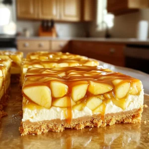 - 1 ½ cups graham cracker crumbs - ½ cup unsalted butter, melted - 2 tablespoons granulated sugar - 2 (8-ounce) packages cream cheese, softened - 1 cup brown sugar, packed - 1 teaspoon vanilla extract - 2 large eggs - 2 medium apples, peeled, cored, and diced (preferably Granny Smith) - ½ teaspoon ground cinnamon - ½ cup caramel sauce (store-bought or homemade) - Optional: additional caramel sauce for drizzling on top When measuring dry ingredients, use a spoon to fill the measuring cup. Avoid packing the ingredients down. For butter, use the markings on the wrapper for accuracy. Remember to soften cream cheese for smooth mixing. Room temperature helps it blend easily. You can replace graham cracker crumbs with crushed cookies like Oreos for a twist. Use coconut oil instead of unsalted butter for a dairy-free option. For a lighter version, try Neufchâtel cheese instead of cream cheese. If you want less sugar, use a sugar substitute that measures cup-for-cup. For apples, any tart apple works well, but Granny Smith stands out. To start, preheat your oven to 325°F (163°C). Next, line an 8x8 inch baking pan with parchment paper. Make sure to leave some paper hanging over the sides. This helps in lifting out the bars later. Now, let’s make the crust. In a medium bowl, combine 1 ½ cups of graham cracker crumbs, ½ cup of melted unsalted butter, and 2 tablespoons of granulated sugar. Mix until it looks like wet sand. Press this mixture into the bottom of your prepared pan. This forms the base of our bars. Bake the crust for about 10 minutes. After that, let it cool while you prepare the filling. For the filling, grab a large mixing bowl. Beat 2 packages of softened cream cheese with an electric mixer. Keep mixing until it's smooth and creamy. Then, add 1 cup of packed brown sugar and 1 teaspoon of vanilla extract. Mix until everything is well blended. Next, add 2 large eggs, one at a time. Mix on low speed until just combined. Be careful not to overmix, as this can cause cracks in your bars. Now, take 2 medium apples, peel, core, and dice them. Preferably use Granny Smith apples. Gently fold the diced apples and ½ teaspoon of ground cinnamon into the cream cheese mixture. Pour this cheesecake filling over your cooled crust. Smooth it out evenly. Drizzle ½ cup of caramel sauce on top. Use a butter knife or toothpick to swirl it into the cheesecake layer. Bake the cheesecake bars for about 30 to 35 minutes. Look for set edges and a slight jiggle in the center. Once done, let the bars cool at room temperature for 1 hour. After that, refrigerate them for at least 4 hours or overnight. This step is key to setting the bars perfectly. When ready to serve, lift the cheesecake from the pan using the parchment overhang. Cut into bars. You can drizzle more caramel sauce on top if you like. Enjoy your delicious creation! When you make caramel apple cheesecake bars, some mistakes can spoil the fun. Here are a few to watch for: - Overmixing the eggs: This can cause cracks. Mix on low until just blended. - Not cooling the crust: If you skip this step, the filling may not set well. - Skipping the chilling time: Chilling helps bars set and makes them easier to cut. The texture of your cheesecake bars is key to their success. Here’s how to get it just right: - Use room temperature cream cheese: This helps create a smooth filling. - Fold in the apples gently: This keeps the mixture light and fluffy. - Bake until just set: The center should jiggle slightly, not be fully firm. Serving your cheesecake bars can be a creative experience. Here are some fun ideas: - Top with extra caramel sauce: This adds a sweet touch and looks great. - Serve with whipped cream: A dollop of cream balances the flavors. - Pair with a scoop of vanilla ice cream: This makes a delightful dessert combo. Enjoy making your caramel apple cheesecake bars with these tips! {{image_2}} You can swap apples for other fruits. Pears work great in these bars. They add a soft texture and sweet flavor. You can also use berries like blueberries or raspberries. These fruits add a fresh twist and a pop of color. Try adding a hint of nutmeg for warmth. This spice pairs well with cinnamon. You can also mix in some chopped nuts for crunch. Walnuts or pecans add a nice texture and flavor. If you want a richer taste, stir in some chocolate chips. They make each bite even more delightful. To make this dessert lighter, use low-fat cream cheese. It still tastes creamy but cuts some calories. You can also replace some sugar with honey or maple syrup. This gives a natural sweetness. For a gluten-free option, use gluten-free graham cracker crumbs. These small swaps keep the taste without losing joy. To keep your caramel apple cheesecake bars fresh, store them in the fridge. Place them in an airtight container. This helps avoid drying out. If you use parchment paper, it makes lifting easier. This way, you can cut bars without making a mess. These bars can last up to five days in the fridge. Make sure to check for any signs of spoilage. If they smell off or look different, it’s best to toss them. They are safe to eat for a few days but taste best fresh. You can freeze these cheesecake bars for later. Cut them into bars first. Wrap each piece tightly in plastic wrap. Then, place them in a freezer-safe bag. They can last up to three months in the freezer. When ready to eat, thaw them in the fridge overnight. Enjoy them cold or warm them up slightly in the oven. Yes, you can pick any apple you like. Granny Smith apples are tart and hold up well. Other good options are Honeycrisp and Fuji apples. These apples add sweetness and flavor. If you prefer a sweeter taste, try using Gala apples. The choice of apples can change the flavor. Use what you have for fun twists. To make these bars gluten-free, swap out the graham crackers. Use gluten-free graham cracker crumbs or almond flour instead. Make sure your caramel sauce is gluten-free too. Check the labels carefully when shopping. This way, you can enjoy these treats without worry. When reheating, use the microwave or the oven. For the microwave, warm a bar for 15-20 seconds. In the oven, preheat to 300°F (150°C) and warm for about 10 minutes. Always check if it’s warm enough. Serve leftovers cold or at room temperature. Drizzle more caramel sauce on top for extra flavor. You learned about the key ingredients and how to measure them. You now know substitutes for when you're missing something. The recipe steps helped you see how to bake with ease. I shared tips to avoid mistakes and the best ways to serve. Exploring variations opens up fun flavors for you to try. Proper storage ensures your cheesecake bars last longer. With these ideas, you're ready to make something great. Enjoy baking and sharing your delicious treats!