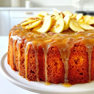 - 2 cups all-purpose flour - 1 teaspoon baking powder - 1/2 teaspoon baking soda - 1/4 teaspoon salt - 1 teaspoon ground cinnamon - 1/4 teaspoon ground nutmeg These dry ingredients create the base for your cake. The flour gives it structure, while the baking powder and baking soda help it rise. The salt enhances the flavors, and the spices add warmth and depth. - 1/2 cup unsalted butter, softened - 1 cup granulated sugar - 3 large eggs - 1 teaspoon vanilla extract - 1/2 cup apple cider The wet ingredients blend to form a rich batter. The butter and sugar create a creamy mix, while the eggs add moisture and richness. Vanilla and apple cider infuse the cake with lovely flavors. - 1 cup powdered sugar - 2 tablespoons apple cider The glaze is the finishing touch. It adds sweetness and a hint of apple flavor. Adjust the mixture until it is just right. You want it pourable but thick enough to coat the cake nicely. First, set your oven to 350°F (175°C). This temperature cooks the cake just right. While it heats, take a 9x5 inch loaf pan. Grease it well with butter or cooking spray. Then, dust the pan with flour. This step helps the cake come out easily after baking. In a medium bowl, measure out 2 cups of all-purpose flour. Add 1 teaspoon of baking powder, 1/2 teaspoon of baking soda, 1/4 teaspoon of salt, 1 teaspoon of ground cinnamon, and 1/4 teaspoon of ground nutmeg. Use a whisk to mix these dry ingredients well. This helps to combine everything evenly. In a large bowl, add 1/2 cup of softened unsalted butter and 1 cup of granulated sugar. Beat them together until the mixture is light and fluffy. This will take about 3 to 4 minutes. Now, add 3 large eggs, one at a time. Mix well after each egg. Finally, stir in 1 teaspoon of vanilla extract. Now, it’s time to combine the dry and wet ingredients. Gradually add the dry mixture to the wet one. Alternate this with 1/2 cup of apple cider. Start and end with the dry mixture. Mix until just combined. Be careful not to overmix; this keeps the cake soft and light. Pour your batter into the prepared loaf pan. Smooth the top with a spatula. Bake it in your preheated oven for about 50 to 60 minutes. Check if it’s done by inserting a toothpick into the center. If it comes out clean, your cake is ready. After baking, let it cool in the pan for 10 minutes. Then, transfer it to a wire rack to cool completely. In a small bowl, mix 1 cup of powdered sugar with 2 tablespoons of apple cider. Stir until you get a smooth glaze. If it’s too thick, add more apple cider. If it’s too thin, add more powdered sugar. Once the cake cools, drizzle the glaze over the top, letting it drip down the sides. Using ingredients at room temperature is key. This helps the batter mix evenly. Cold butter or eggs can make the cake dense. For best results, take them out ahead of time. To check if the cake is done, use a toothpick. Insert it in the center of the cake. If it comes out clean, the cake is ready. If it has batter on it, bake a little longer. When glazing the cake, do it slowly. Start at the center and let it drip down the sides. This gives a nice look. If the glaze is too thick, add more apple cider. If it's too thin, add more powdered sugar. You can also enhance the glaze with spices. A pinch of cinnamon or nutmeg adds warmth. A splash of vanilla extract gives it a sweet note. For a beautiful presentation, slice the cake neatly. Serve it on a rustic wooden board. Garnish with thin apple slices and a sprinkle of cinnamon. This adds color and draws the eye. Pair the cake with hot tea or coffee. A scoop of vanilla ice cream also works well. The warm cake and cold ice cream create a lovely contrast. {{image_2}} You can easily change the taste of your pound cake. Consider adding nuts or dried fruit. Walnuts or pecans add a nice crunch. Dried cranberries or raisins give a sweet burst. You can also try new spices. A hint of ginger or clove can work wonders. Each addition brings a new twist to the classic recipe. If you need a gluten-free option, swap all-purpose flour for a gluten-free blend. Many brands work well in baking. To make a healthier cake, reduce the sugar. You can cut the sugar by a third and still enjoy great flavor. Use applesauce or mashed bananas to add moisture and sweetness. The glaze is where you can get creative! Try using maple syrup instead of powdered sugar. You can also add flavors like vanilla or almond extract. Honey or agave syrup can work too. Each choice changes the taste and makes it special. To keep your apple cider glazed pound cake fresh, use an airtight container. A cake dome or a plastic wrap can also work well. Store it at room temperature for the best taste. If you want it to last longer, put it in the fridge. Just remember, cold air can dry it out. If you need to freeze the pound cake, wrap it tightly in plastic wrap. Then, place it in a freezer bag. This helps keep out air and moisture. Label the bag with the date, so you know when to use it. To thaw, move it to the fridge overnight. Reheat it in the oven at 350°F for about 10-15 minutes. This will bring back its fresh taste and texture. At room temperature, the cake stays fresh for about 3-4 days. If you store it in the fridge, it can last up to a week. The glaze may soften a bit, but the flavor remains great. Always check for any signs of spoilage before enjoying. Yes, you can swap apple cider for apple juice. The flavor will change a bit, but it still works well. You might also use a mix of apple juice and a splash of vinegar. This gives a slight tang to mimic cider's taste. To check if the cake is done, use a toothpick. Insert it into the center of the cake. If it comes out clean or with a few crumbs, your cake is ready. If it has wet batter on it, bake for a few more minutes. To store the cake, wrap it in plastic wrap or foil. Keep it at room temperature for up to three days. For longer storage, place it in the fridge. Just remember to let it come back to room temp before serving. Yes, you can bake this cake a day or two ahead of time. It keeps well and tastes great after a day. Just store it in an airtight container to keep it fresh. You can glaze it right before serving for the best look. You learned how to make a delicious apple cider-glazed pound cake. We covered the key ingredients, step-by-step baking instructions, and valuable tips. Each detail helped ensure your baking success. You can customize the cake with different flavors or dietary needs too. Finally, proper storage keeps your cake fresh longer. Enjoy creating this treat and impressing your friends and family! Happy baking!