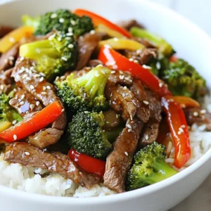 - 1 pound flank steak - 2 cups broccoli florets - 1 red bell pepper - Soy sauce - Oyster sauce - Cornstarch - 4 cloves garlic, minced - 2 tablespoons fresh ginger, minced - 2 tablespoons vegetable oil - 1 tablespoon sesame oil - Cooked jasmine rice for serving - Sesame seeds for garnish This recipe shines with simple, fresh ingredients. The star is flank steak, a flavorful cut that cooks quickly. Broccoli and red bell pepper add vibrant color and crunch. For the marinade, soy sauce and oyster sauce work together to give depth. Cornstarch helps tenderize the beef and thicken the sauce. You need garlic and ginger for a fragrant base. The vegetable oil is essential for cooking, while sesame oil brings a nutty finish. Finally, jasmine rice pairs perfectly to soak up the sauce. Gather these items before you start cooking. Having everything ready makes the process smooth and fun. {{ingredient_image_1}} To start, we need to marinate the flank steak. Slice it thinly against the grain. This helps make the meat tender. In a mixing bowl, add the steak with soy sauce, oyster sauce, and cornstarch. Mix well to coat every piece. Let it marinate for at least 20 minutes. This time is key for flavor and tenderness. Next, we will cook the beef. Heat 1 tablespoon of vegetable oil in a large skillet over medium-high heat. Once hot, add the marinated beef in a single layer. Sauté it for about 3-4 minutes until it turns a nice brown color. Make sure not to overcrowd the pan. This ensures a good sear. After browning, remove the beef from the skillet and set it aside. Now it's time to stir-fry the veggies. In the same skillet, add another tablespoon of vegetable oil. Toss in 4 cloves of minced garlic and 2 tablespoons of minced ginger. Cook for about 30 seconds until they smell great. Then, add 2 cups of broccoli florets and the sliced red bell pepper. Stir-fry these for about 3-4 minutes. You want them vibrant and slightly tender, but not mushy. Finally, let's bring it all together. Return the cooked beef to the skillet. Pour in the remaining marinade from the bowl. Stir everything together. Let it cook for about 2-3 minutes. This thickens the sauce and coats the beef and veggies nicely. Drizzle with sesame oil before serving. This adds a rich flavor. Enjoy your meal hot over cooked jasmine rice, garnished with sesame seeds for some crunch! Using high-quality ingredients is key for great taste. Choose fresh broccoli, tender flank steak, and good sauces. Soy sauce and oyster sauce add depth. You can try alternatives like tamari for gluten-free or hoisin for a sweeter touch. Cutting the beef correctly makes a big difference. Always slice the flank steak against the grain. This keeps the meat tender. Marinating the beef helps too. Use the marinade for at least 20 minutes. It adds flavor and softens the meat nicely. Garnishing with sesame seeds adds a nice touch. They give a bit of crunch and look great. Serve your beef and broccoli over fluffy jasmine rice. This makes the dish feel complete. You can also add a slice of lime for a pop of color and taste. Pro Tips Marinate for Flavor: Letting the flank steak marinate for at least 20 minutes infuses it with flavor and helps to tenderize the meat, enhancing the overall dish. High Heat for Searing: Use high heat when cooking the beef to achieve a nice sear. This locks in juices and gives the meat a delicious crust. Veggie Crunch: To maintain the broccoli's crunch, stir-fry it until just tender but still vibrant in color. This adds a fresh texture to the dish. Finish with Sesame Oil: Drizzling sesame oil at the end of cooking adds a fragrant finish to the dish, elevating the flavors. {{image_2}} You can switch up the veggies in this dish. Carrots add sweetness and color. Snap peas give a nice crunch. Mushrooms add a rich flavor. Feel free to use seasonal veggies, like zucchini in summer or bok choy in spring. If you want a change from beef, try chicken, tofu, or shrimp. Chicken cooks fast, so cut it thin. Tofu needs pressing to remove moisture. It soaks up the sauce well. Shrimp cooks quickly, so add it last to avoid overcooking. For a gluten-free meal, replace soy sauce with tamari or coconut aminos. Use cornstarch as a thickener, or try arrowroot powder for a lighter sauce. These swaps keep the dish tasty while catering to dietary needs. To keep your beef and broccoli fresh, use proper refrigeration techniques. First, let the dish cool down to room temperature. Then, transfer the leftovers into airtight containers. This helps prevent air from spoiling the food. I recommend using glass or BPA-free plastic containers. These materials are safe and keep your meal flavorful. When reheating, you want to keep the flavors and texture intact. The best method is the stovetop. Just add a little water or broth to a pan over low heat. Stir occasionally until warmed through. If you prefer the microwave, use it on a lower power setting. Heat for short bursts and stir between to avoid uneven heating. You can freeze both cooked and uncooked versions of this dish. For cooked beef and broccoli, cool it completely and then pack it into airtight containers or freezer bags. It will last up to three months in the freezer. If freezing uncooked beef, marinate it first and then freeze it. Use it within three months for best quality. Yes, you can! If you don't have flank steak, try these cuts: - Sirloin - Round steak - Ribeye These meats are tender and flavorful. You may need to adjust cooking times for different cuts. Here are some great sides to pair with this dish: - Steamed jasmine rice - Fried rice - Noodles - Egg rolls These sides will enhance your meal and add variety. To add heat, consider these options: - Red pepper flakes - Sriracha sauce - Spicy chili sauce Add them during cooking to control the heat level. Yes, you can easily make it vegetarian! Here are some tips: - Use tofu instead of beef. - Substitute soy sauce with a vegetarian alternative. - Add more veggies like bell peppers or carrots. These swaps keep the dish tasty and satisfying. You can explore different flavors by trying: - Teriyaki sauce - Hoisin sauce - Black bean sauce Each sauce brings a unique twist to your beef and broccoli dish! This post covered everything you need to make Chinese Beef and Broccoli. We explored main ingredients like flank steak, broccoli, and red bell pepper. You learned about the marinade and cooking steps. I shared tips for flavor, presentation, and variations to fit your taste. In conclusion, use high-quality ingredients and techniques for the best experience. Whether you stick to the classic recipe or try new proteins, you can enjoy this dish any way you like. Happy cooking!
