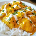 - 1 ½ lbs boneless chicken thighs, cut into bite-sized pieces - 1 cup plain yogurt - 2 tablespoons ginger-garlic paste - 2 tablespoons lemon juice - 2 teaspoons garam masala - 1 teaspoon ground cumin - 1 teaspoon ground coriander - 1 teaspoon turmeric powder - ½ teaspoon cayenne pepper (adjust to taste) - Salt to taste - 3 tablespoons unsalted butter - 1 large onion, finely chopped - 1 cup crushed tomatoes - 1 cup heavy cream - Fresh cilantro, chopped for garnish The main ingredients for butter chicken are simple yet flavorful. Boneless chicken thighs give a juicy bite. The yogurt helps to tenderize the meat. Spices like garam masala and turmeric add warmth and depth. The crushed tomatoes and heavy cream make the sauce creamy and rich. - Mixing bowl - Large cooking pan - Measuring spoons and cups You will need a few essential kitchen tools. A mixing bowl is great for marinating the chicken. A large cooking pan helps to cook everything evenly. Measuring spoons and cups ensure you get the right amounts of each ingredient. Having these tools ready makes cooking smooth and easy. {{ingredient_image_1}} To start, you need to combine yogurt and spices. In a large mixing bowl, mix 1 cup of plain yogurt with 2 tablespoons of ginger-garlic paste, 2 tablespoons of lemon juice, 2 teaspoons of garam masala, 1 teaspoon of ground cumin, 1 teaspoon of ground coriander, 1 teaspoon of turmeric powder, and ½ teaspoon of cayenne pepper. Don’t forget to add salt to your taste. Next, coat the chicken pieces. Take 1 ½ lbs of boneless chicken thighs, cut into bite-sized pieces, and mix them well with the yogurt mixture. Make sure every piece is evenly coated. After that, cover the bowl and let it marinate. You can do this for at least 1 hour, but overnight in the fridge gives better flavor. Now, it's time to cook. Start by sautéing onions. Heat 3 tablespoons of unsalted butter in a large pan over medium heat. Add 1 finely chopped large onion and sauté it until golden brown, which takes about 5-7 minutes. After the onions are ready, add the marinated chicken to the pan. Cook the chicken for about 10 minutes, stirring occasionally. You want the chicken to be browned and cooked through. Once the chicken is browned, it’s time to add crushed tomatoes. Pour in 1 cup of crushed tomatoes and let the mixture simmer for 15 minutes. This step allows the dish to thicken and develop rich flavors. For the final touch, stir in heavy cream. Lower the heat and pour in 1 cup of heavy cream. Let it simmer for an additional 5 minutes. This step helps the flavors meld together beautifully. Adjust the seasoning if needed. Lastly, garnish with cilantro. Before serving, sprinkle fresh chopped cilantro on top for a lovely finish. Enjoy your homemade butter chicken over basmati rice or with garlic naan! Using fresh spices makes a big difference. They add strong taste and aroma. I always recommend whole spices for the best flavor. You can grind them just before cooking for a lovely scent. Marinating the chicken is key. I suggest marinating for at least one hour. For the best results, try marinating overnight. This adds depth to the dish and makes the chicken juicy. Balancing creaminess with seasoning is important. Too much cream can dull the flavors. Start with a little cream, then taste and adjust. Cooking temperature control matters, too. Use medium heat to cook the chicken. This helps it brown nicely without drying out. When you add cream, lower the heat. This gives the sauce a chance to thicken while keeping it rich and smooth. Pro Tips Marination Magic: Allow the chicken to marinate overnight for a more intense flavor and tender texture. Butter Balance: Use a mix of ghee and butter for a richer taste and authentic Indian flavor. Spice it Up: Adjust the cayenne pepper according to your heat preference; start with less and add more as needed. Garnish Glamour: Top with toasted cashews or almonds for an extra crunch and a touch of elegance. {{image_2}} You can change the spice level in butter chicken easily. If you want more heat, adjust the cayenne pepper. Start with half a teaspoon and taste as you go. This way, you can find the right spice for your family. If you enjoy extra heat, think about adding fresh chili. You can chop up green chilies and mix them in with the onions. This adds a nice kick and more flavor. Just remember to use the chili sparingly, especially if you have kids. You can switch some ingredients if needed. For a lighter dish, use chicken breast instead of thighs. Chicken breast cooks faster and is leaner. Just make sure to check it is fully cooked. If you have dietary needs, there are good alternatives too. You can use coconut milk instead of heavy cream for a dairy-free option. This adds a nice, rich flavor. Also, you can try tofu for a vegetarian dish. Just marinate and cook it like you would chicken. After making butter chicken, let it cool down first. Store leftovers in an airtight container. Keep it in the fridge for up to three days. When you want to reheat, use the stove or microwave. Stir it well to heat evenly. Add a splash of cream or water if it looks thick. To freeze butter chicken, let it cool completely. Place it in a freezer-safe container. It stays good for up to three months. When you're ready to eat, take it out and thaw it in the fridge overnight. Reheat it on the stove over low heat. Stir well and enjoy! You can enjoy butter chicken with several tasty sides. Here are some great options: - Steamed basmati rice: It soaks up the rich sauce well. - Garlic naan: This bread is perfect for dipping. - Vegetable curry: A light curry pairs nicely. - Salad: A fresh salad adds a crunchy contrast. These sides make your meal complete and satisfy all taste buds. Yes, you can prepare butter chicken ahead of time. Here are some tips: - Marinate the chicken: Do this a day early for better flavor. - Cook and chill: You can cook it and store it in the fridge for up to three days. - Reheat gently: Use a low heat to warm it up and prevent drying. Planning ahead saves time and makes dinner easier. Butter chicken can be mild or spicy, depending on your taste. Here’s how to adjust spice levels: - Cayenne pepper: Start with less if you prefer mild. - Add chili: You can add fresh chili for extra heat. - Taste as you go: Always taste the sauce before serving to adjust. This flexibility makes butter chicken enjoyable for everyone. In this guide, I covered key ingredients for butter chicken, including chicken, spices, and dairy. You learned essential tools like mixing bowls and pans. I explained how to marinate, cook, and add final touches for flavor. I also included tips for authentic taste and texture, variations for spice levels, and storage advice. Butter chicken is a dish you can easily make your own. With these steps and tips, you can enjoy a tasty meal tailored to your preferences. Enjoy your cooking journey!