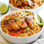 - 300g egg noodles - 2 chicken breasts, sliced thinly - 4 tablespoons soy sauce - 2 tablespoons honey - 4 cloves garlic, minced - 1 tablespoon ginger, freshly grated - 1 tablespoon sesame oil - 2 tablespoons vegetable oil - 1 red bell pepper, sliced - 2 green onions, chopped - 1 tablespoon sesame seeds - Salt and black pepper to taste To make sticky garlic chicken noodles, you need simple and fresh ingredients. Start with 300 grams of egg noodles. They give the dish a great texture and soak up the sauce well. For protein, use two chicken breasts sliced thinly. This helps them cook quickly and evenly. The sauce needs four tablespoons of soy sauce and two tablespoons of honey. These two ingredients make the dish sweet and savory. You also need four cloves of minced garlic and one tablespoon of freshly grated ginger. These aromatics bring lots of flavor. For cooking, add one tablespoon of sesame oil and two tablespoons of vegetable oil to your pan. They help brown the chicken and add a nice taste. Don’t forget the veggies! Use one sliced red bell pepper and two chopped green onions for color and crunch. Finally, sprinkle one tablespoon of sesame seeds on top for a fun finish. Remember to season with salt and black pepper to taste. These ingredients create a tasty, balanced meal that you will love. {{ingredient_image_1}} 1. Start by bringing a large pot of water to a boil. This will ensure your noodles cook evenly. 2. Cook the egg noodles according to the package instructions. This usually takes about 4 to 6 minutes. 3. After cooking, drain the noodles in a colander. To prevent sticking, toss them with a tablespoon of sesame oil. This adds flavor and keeps them from clumping together. 1. In a small bowl, mix together four tablespoons of soy sauce, two tablespoons of honey, four minced garlic cloves, and one tablespoon of freshly grated ginger. 2. Stir until the mixture is well combined. This sticky sauce will coat the noodles and chicken beautifully. 1. Heat two tablespoons of vegetable oil in a large pan over medium-high heat. 2. Add the thinly sliced chicken breasts. Season them with salt and black pepper. 3. Cook for about 5 to 7 minutes until the chicken turns golden brown and is cooked through. 1. Lower the heat to medium. Add sliced red bell pepper to the pan with the chicken. 2. Stir-fry for about 3 minutes. You want the pepper to be slightly softened but still crisp. This gives the dish great texture. 1. Add the cooked noodles to the pan with the chicken and peppers. 2. Pour the sticky garlic sauce over the noodles. 3. Toss everything together gently until the noodles are well-coated and heated through. This is where the magic happens! 1. To finish, sprinkle a tablespoon of sesame seeds and chopped green onions on top. 2. Give everything a gentle stir to combine. This adds a nice crunch and fresh flavor. 3. Serve the sticky garlic chicken noodles in deep bowls. If you like, add an extra sprinkle of sesame seeds and a slice of lime for a zesty kick. To get your chicken golden brown, use high heat. Heat the vegetable oil until it shimmers. This helps the chicken sear nicely. Spread the chicken in the pan without crowding it. This allows even cooking and browning. Cook the chicken for about 5-7 minutes until it's no longer pink inside. Use a meat thermometer; it should read 165°F (75°C) for safety. To prevent overcooking the noodles, watch the clock. Follow the package instructions closely. Test the noodles a minute before the time ends. They should be firm but cooked. After draining, toss them with sesame oil. This keeps them from sticking together. Adjusting the sauce is key to a great taste. If you like it sweeter, add more honey. For a saltier flavor, increase the soy sauce. You can even add a splash of rice vinegar for tang. Taste the sauce before adding it to the noodles. This ensures it matches your preference perfectly. Pro Tips Use Fresh Ingredients: Fresh garlic and ginger will enhance the flavor of your sticky sauce significantly compared to dried or jarred versions. Adjust the Sweetness: Feel free to adjust the amount of honey based on your preference for sweetness. You can also substitute it with maple syrup for a different flavor. Protein Variations: This recipe works wonderfully with shrimp, tofu, or beef as alternatives to chicken, allowing for versatile meal options. Meal Prep Friendly: Make the sauce and prep the chicken and vegetables ahead of time. This will save you time on busy weeknights! {{image_2}} You can switch the chicken for shrimp or tofu. Shrimp cooks fast and adds a nice flavor. Just sauté the shrimp until pink. If you choose tofu, use firm tofu. Cube it and fry until golden for a tasty crunch. Both options give you a great protein boost. You can add more veggies for extra taste and color. Try broccoli, snap peas, or carrots. They keep the dish fresh and crunchy. You can also use seasonal veggies. In summer, add zucchini or bell peppers. In fall, think about using mushrooms or spinach. This way, you get a dish that changes with the seasons. Feel free to play with the sauce. Use maple syrup or agave instead of honey. You can mix in chili sauce for some heat. If you want a different flavor, try teriyaki or oyster sauce. These changes let you create new taste profiles and make the dish your own. To keep your sticky garlic chicken noodles fresh, store them in an airtight container. Make sure to let them cool down first. Place them in the fridge. They will last for about 3 to 4 days. If you want to keep them longer, consider freezing. When you're ready to eat, reheat the noodles gently. You can use a microwave or a skillet. If using a microwave, heat in short bursts. Stir between to avoid hot spots. If using a skillet, add a splash of water to keep noodles moist. This helps maintain their tasty texture and flavor. To freeze, divide the noodles into portions. Place them in freezer-safe bags or containers. Remove as much air as you can before sealing. They can last up to 2 months in the freezer. To defrost, move them to the fridge overnight. You can also use the microwave on the defrost setting. Reheat as mentioned earlier to enjoy a delicious meal later! If you need gluten-free options, you can use rice noodles or zucchini noodles. Rice noodles cook fast and soak up flavors well. Zucchini noodles, or zoodles, are fresh and light. They add a fun twist to your dish. To add heat, you can use crushed red pepper flakes or sliced fresh chili peppers. Another option is to add a dash of hot sauce. Start with a little and taste as you go. This way, you can find the right level of heat for your taste. Yes, you can meal prep Sticky Garlic Chicken Noodles. Cook a large batch and store it in airtight containers. Keep it in the fridge for up to three days. Reheat in a pan or microwave before serving. This makes for easy lunches or dinners. Leftovers last about three to four days in the fridge. Make sure to store them in a sealed container. If you want to keep them longer, you can freeze them. Frozen leftovers can last up to three months. This blog post shared a simple recipe for a tasty noodle dish. I broke down the key ingredients, including chicken and vegetables, along with making a sticky sauce. You learned step-by-step how to cook the noodles, chicken, and veggies. I also covered cooking tips, variations, and storage advice. Cooking can be fun and flavorful. You now have the tools to create your own version. Enjoy experimenting with flavors and ingredients!