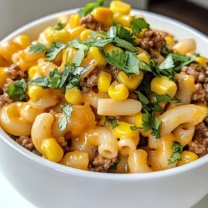 - 8 oz elbow macaroni - 1 lb ground beef or turkey - 1 can diced tomatoes with green chilies - 1 packet taco seasoning - 1 cup shredded cheddar cheese - 1 cup sour cream - ¼ cup chopped fresh cilantro - Salt and pepper to taste - 1 cup corn kernels When I make Cheesy Taco Pasta, I rely on a few key ingredients. The base starts with elbow macaroni. This pasta is perfect for holding all the cheesy goodness. I use either ground beef or turkey as my protein. Both options work well and add flavor. Next, I add a can of diced tomatoes with green chilies. This gives the dish a nice kick. For flavor, I use taco seasoning. It adds that classic taco taste that everyone loves. Cheddar cheese is a must-have. I use a whole cup to make it creamy and rich. Sour cream adds a nice tang and makes the pasta smooth. I like to jazz it up with optional garnishes. Fresh cilantro adds a pop of color and flavor. A sprinkle of salt and pepper boosts everything. Corn kernels bring sweetness and texture. These ingredients come together for a meal that is quick, easy, and full of flavor. {{ingredient_image_1}} To cook elbow macaroni, start by bringing a large pot of salted water to a boil. Once the water is boiling, add 8 ounces of elbow macaroni. Cook it according to the package instructions until it is al dente, which means it should have a slight bite to it. This usually takes about 7-9 minutes. After cooking, drain the pasta in a colander and set it aside. Make sure not to rinse the macaroni, as you want it to keep some of its starch. In the same pot, add 1 pound of ground beef or turkey over medium heat. Cook it for about 6-8 minutes, breaking it apart with a spoon as it cooks. You want the meat to be browned all over. Next, add 1 small diced onion and 2 minced cloves of garlic to the pot. Sauté these for 3-4 minutes until the onion looks translucent. This step adds great flavor to the meat. Now it's time to add some flavor! Stir in 1 packet of taco seasoning until the meat and veggies are fully coated. Then, pour in 1 can of diced tomatoes with green chilies, along with 1 cup of beef broth. Stir this mixture well and let it simmer for a few minutes. Once it starts to bubble, add the cooked macaroni, 1 cup of corn kernels, and 1 cup of sour cream. Mix everything together until it's warm and well combined, which should take about 3-5 minutes. Finally, sprinkle in 1 cup of shredded cheddar cheese. Stir until the cheese melts and makes everything creamy. Enjoy your flavorful dish! To make perfect Cheesy Taco Pasta, cook your macaroni until it is al dente. This means it should be firm to the bite. Follow the package instructions, but check a minute or two early. Drain it well and set it aside. This step makes sure the pasta holds its shape when mixed with the other ingredients. When browning the meat, heat your pot over medium heat. Add the ground beef or turkey and break it apart with a spoon. Cook for about 6-8 minutes until it is browned evenly. Stir often to avoid burning. This helps to keep the meat juicy and tasty. Adjusting seasoning is simple. After adding the taco seasoning, taste the mix. If you want it spicier, add a pinch of chili powder or a dash of hot sauce. For a milder flavor, add more sour cream to balance it out. Always remember, you can add but can't take away, so start small. Choosing the right cheese can elevate your dish. While I love cheddar cheese, you can mix it up! Try Monterey Jack for a creamier taste or pepper jack for extra heat. Mixing cheeses adds depth and richness to your meal. Serving your Cheesy Taco Pasta in colorful bowls makes it more fun. Use vibrant dishes to highlight the dish's colors. Add extra cheese on top for a cheesy look. Garnish with chopped cilantro for a pop of green. A squeeze of lime just before serving adds a zingy touch and brightens the dish. Pro Tips Perfect Pasta: Always cook your pasta al dente to prevent it from becoming mushy when combined with the sauce. Flavor Boost: Add a splash of lime juice before serving to enhance the flavors and add a zesty kick. Meat Alternatives: For a healthier twist, substitute ground turkey or chicken for the beef, or make it vegetarian by using black beans. Cheesy Goodness: For an extra cheesy experience, mix in different types of cheese like Monterey Jack or Pepper Jack along with the cheddar. {{image_2}} You can switch the ground beef with ground chicken or turkey. Both options work great. If you want a plant-based dish, use lentils or crumbled tofu. They soak up all the taco flavors. For a vegetarian option, try black beans or chickpeas. These add protein and fiber. If you need gluten-free pasta, look for brands made from rice or corn. They cook well and taste good too. For those avoiding dairy, many stores sell dairy-free cheese. Look for options made from nuts or soy. You can use non-dairy sour cream to keep the dish creamy. Want more heat? Add spices like cayenne pepper or chili powder. You can also pour in your favorite hot sauce. For extra crunch, toss in bell peppers or zucchini. Fresh spinach or kale adds nutrients without changing the taste much. Don't be afraid to mix your favorite veggies! To store leftover Cheesy Taco Pasta, let it cool first. Place the pasta in an airtight container. This keeps it fresh and tasty. In the fridge, it lasts about 3 to 4 days. Always check for any signs of spoilage before eating. To freeze Cheesy Taco Pasta, first cool it completely. Then, transfer it into a freezer-safe container or bag. Make sure to remove as much air as possible. It can stay frozen for up to 3 months. When you're ready to eat it, take it out of the freezer and let it thaw in the fridge overnight. To avoid dry pasta, add a splash of beef broth or water when reheating. This keeps it moist and creamy. You can reheat it on the stove or in the microwave. If using the microwave, cover the dish with a lid or a damp paper towel. This traps steam and helps keep your pasta from drying out. Stir occasionally to heat evenly. Yes, you can make Cheesy Taco Pasta ahead of time. To prep for the week, cook the pasta and meat mixture as usual. Let it cool completely before storing. Place the pasta in an airtight container in the fridge for up to three days. When ready to eat, reheat it on the stove or microwave. Stir in a bit of water or broth to keep it moist. If you don’t have sour cream, you have options. You can use Greek yogurt for a similar tangy taste. Cream cheese also works well, making the dish creamy. For a lighter choice, try cottage cheese. Each option keeps the dish rich and tasty. Yes, making this dish vegetarian is easy! Swap the ground beef or turkey for a plant-based protein, like lentils or black beans. You can also use diced bell peppers or mushrooms for added texture. Just follow the same steps in the recipe for a delicious meatless meal. This blog post covered how to make tasty Cheesy Taco Pasta. You learned about the key ingredients, step-by-step cooking, and useful tips. We also explored variations for different diets and how to store leftovers. Enjoying this dish is easy and fun. You can mix flavors and make it your own. This recipe fits many tastes and meal plans. Now, grab your ingredients and get cooking! Your kitchen is ready for a delicious adventure.