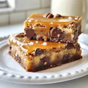 To make Knock You Naked Cookie Bars, gather these key ingredients: - 1 cup unsalted butter, softened - 1 cup brown sugar, packed - 1/2 cup granulated sugar - 2 large eggs - 2 teaspoons vanilla extract - 2 cups all-purpose flour - 1 teaspoon baking soda - 1/2 teaspoon salt - 1 cup chocolate chips (semi-sweet or dark) - 1 cup chopped pecans (or walnuts) - 1/2 cup caramel sauce Each ingredient plays a vital role in the flavor and texture. Here are some tips: - Butter: Unsalted butter gives you control over the salt. You can use salted butter, but reduce the added salt by half. - Sugars: Brown sugar adds moisture and a rich flavor. If you run out, use all granulated sugar. - Eggs: Large eggs help bind the ingredients. You can use flax eggs for a vegan option. - Flour: All-purpose flour is best for texture. For gluten-free bars, use a 1:1 gluten-free flour blend. - Nuts: Pecans or walnuts add crunch. You can skip nuts for nut-free bars or swap them for seeds. - Caramel Sauce: Store-bought works great, but homemade adds a special touch. Accurate measuring is key to great cookie bars. Here’s how: - Butter: Use a kitchen scale for precision. If using cups, pack it firmly into the measuring cup. - Brown Sugar: Always pack brown sugar into the cup for accuracy. It should hold its shape when removed. - Flour: Spoon the flour into the measuring cup and level it off with a knife. Avoid scooping directly from the bag. - Liquid Ingredients: Use liquid measuring cups for eggs and vanilla. Check the measurement at eye level for accuracy. - Nuts and Chips: Use a dry measuring cup for nuts and chocolate chips. Fill it to the top and level off. By following these tips, you will set yourself up for success in making these delightful cookie bars! {{ingredient_image_1}} Start by preheating your oven to 350°F (175°C). Grease a 9x13 inch baking pan with butter. You can also use parchment paper for easy removal. This step helps the bars come out cleanly after baking. In a large bowl, cream together 1 cup of softened butter, 1 cup of brown sugar, and 1/2 cup of granulated sugar. Mix until it feels light and fluffy. Next, add 2 large eggs one at a time. Beat well after each addition. Stir in 2 teaspoons of vanilla extract. In another bowl, whisk together 2 cups of all-purpose flour, 1 teaspoon of baking soda, and 1/2 teaspoon of salt. Gradually add this dry mix to your wet mix. Combine until just mixed. Finally, fold in 1 cup of chocolate chips and 1 cup of chopped pecans. Spread half of the cookie dough evenly in your prepared pan. Press it down firmly with a spatula or your hands. Drizzle 1/2 cup of caramel sauce over this layer. Spread it out evenly. Take the remaining cookie dough and crumble it over the caramel layer. Make sure some caramel peeks through. Bake in the oven for 25-30 minutes. The top should be golden brown. A toothpick should come out mostly clean, with a little gooeyness being okay. Let the bars cool in the pan for 15 minutes before cutting them. They will be easier to slice when warm but slightly cooled. When making Knock You Naked Cookie Bars, avoid over-mixing the dough. Mix just until the flour disappears. This keeps the bars soft and chewy. Also, don’t skip the cooling step. Cutting them too soon makes a mess. Let them cool for at least 15 minutes. To get the perfect caramel drizzle, warm the sauce slightly. This makes it easier to spread. Use a spoon or a squeeze bottle for control. Drizzle it evenly over the first layer of dough. Don’t worry if it doesn’t cover fully; it adds charm. Use a sturdy mixing bowl and a hand mixer. This helps cream the butter and sugars well. A rubber spatula is great for folding in chips and nuts. For baking, a 9x13 inch pan is ideal. Parchment paper makes removal a breeze. Pro Tips Use Room Temperature Ingredients: Make sure your butter and eggs are at room temperature for better incorporation and a smoother dough. Don’t Overmix the Dough: Mix until just combined to keep the cookie bars tender and chewy. Overmixing can lead to tough bars. Chill the Dough: For thicker and chewier bars, consider chilling the cookie dough for 30 minutes before baking. This also helps enhance the flavors. Check for Doneness: The bars are done when the edges are golden brown and the center is still slightly gooey. They will continue to firm up as they cool. {{image_2}} You can make Knock You Naked Cookie Bars even better with fun add-ins. Try mixing in 1 cup of peanut butter chips for a nutty twist. You can also use butterscotch chips for a sweeter treat. If you love fruit, chop up dried cherries or cranberries. These add a nice burst of flavor. You can swap pecans for walnuts or almonds if you prefer. Everyone has their own taste, so feel free to get creative! If you want gluten-free bars, use a gluten-free flour blend. Make sure it has a good binding agent like xanthan gum. For a vegan version, replace the butter with coconut oil or vegan butter. Use flax eggs instead of regular eggs. Mix 1 tablespoon of flaxseed meal with 2.5 tablespoons of water for each egg. This will keep the bars delicious while meeting your dietary needs. You can change the bars for special occasions. For Halloween, add orange and black sprinkles on top. In December, mix in peppermint chips and drizzle with white chocolate for a festive look. For Valentine’s Day, use heart-shaped cookie cutters to serve. You can even add a hint of cinnamon or nutmeg for fall flavors. Each season brings a chance to enjoy these bars in new ways! To keep your Knock You Naked Cookie Bars fresh, store them in an airtight container. This keeps them soft and chewy. If you stack them, place parchment paper between the layers. This step prevents sticking. You can also wrap them tightly in plastic wrap. These cookie bars last about a week at room temperature. If you want them to last longer, freeze them. Cut the bars first, then wrap each piece in plastic wrap. Place the wrapped bars in a freezer bag. They can stay in the freezer for up to three months. When you’re ready to enjoy, let them thaw at room temperature. To enjoy these cookie bars warm, reheat them in the microwave. Heat for about 10-15 seconds. Check to see if they are warm enough. If not, heat for a few more seconds. You can also reheat them in the oven. Set the oven to 350°F (175°C) and bake for 5-10 minutes. This keeps the bars nice and gooey. Knock You Naked Cookie Bars are rich, gooey treats. They mix chocolate chips, nuts, and caramel. The cookie base is soft and chewy. You get layers of flavor in every bite. They are perfect for sharing or enjoying alone. Each bar is a sweet delight that’s hard to resist. Yes, you can make these cookie bars without nuts. Just leave out the chopped pecans or walnuts. The bars will still taste amazing. You can also add extras if you want. Consider using more chocolate chips or even dried fruit. You can tell the bars are done when the top turns golden brown. Insert a toothpick into the center. If it comes out mostly clean, they are ready. A little gooeyness is okay; it adds to the charm. Let them cool for a bit before cutting. You can substitute caramel sauce with chocolate sauce or fudge. It will change the flavor but still be tasty. You can also use homemade caramel if you prefer. Just ensure it’s thick enough to layer on the dough. Adjust the sweetness as needed for balance. In this post, I covered key steps to make Knock You Naked Cookie Bars. We explored ingredients, methods, and helpful tips. You learned about measuring, mixing, and layering for the best result. I shared common mistakes and how to store these treats. Whether you prefer vegan or gluten-free versions, there’s something for everyone. Enjoying your cookie bars fresh or reheated will enhance your delight. Baking is fun, so get started. Happy baking!